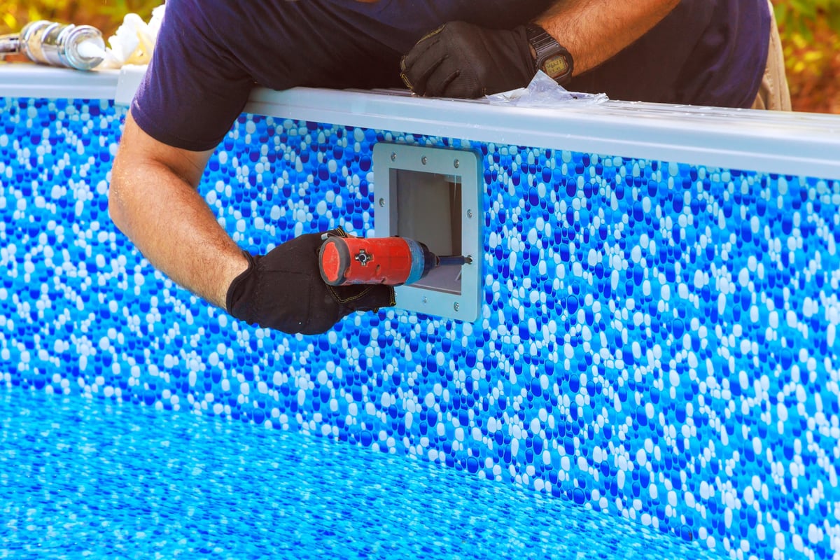 Cleaning of water surface pool with skimmer basket that is mounted to frame collects dirt trash with filtration system for pool maintenance